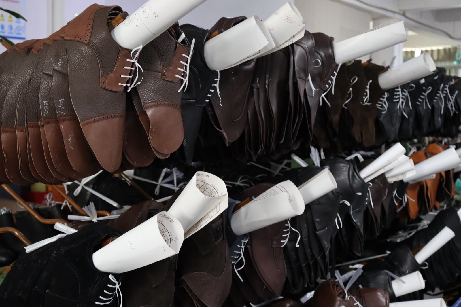 Shoe uppers moving through the production line